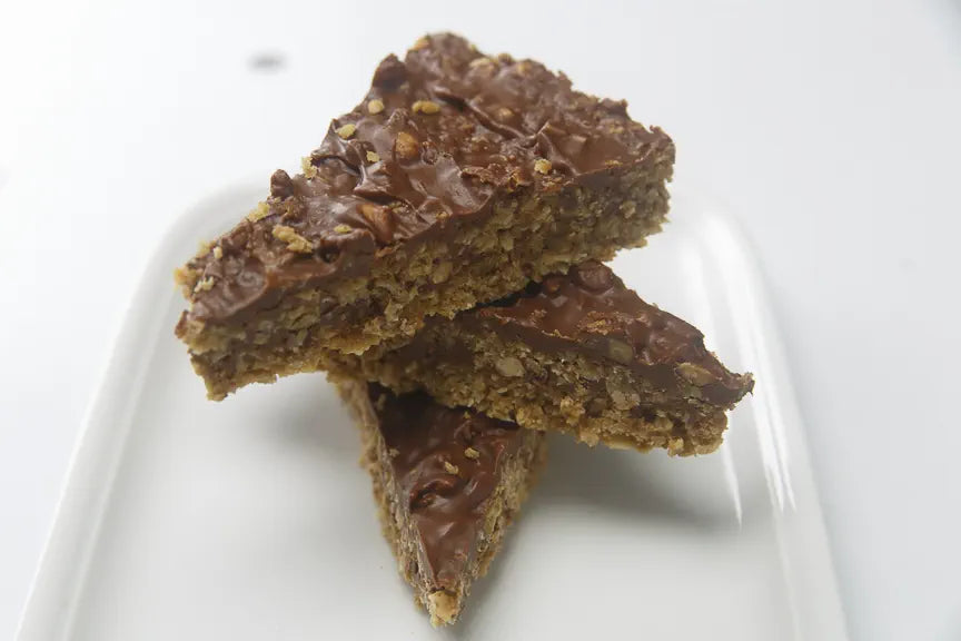 No-bake oat and chocolate bars cut into portions